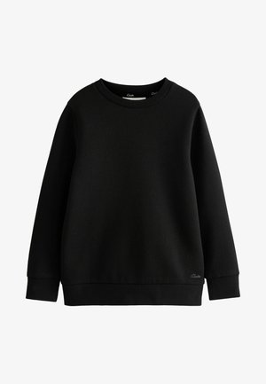 Crna dukserica napravljena od mekog materijala, s okruglim izrezom, dugim rukavima i rebrastim manžetama. Uključuje suptilan logo na rubu.