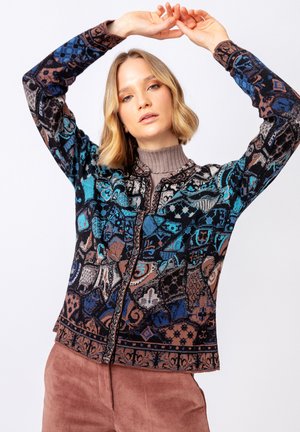Multicolored cardigan featuring intricate patterns in blue, brown, and black; button closure; textured fabric; ribbed collar.