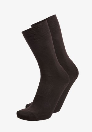 Calzini neri in cotone con punta e tallone rinforzati. Presentano un polsino a coste per una vestibilità sicura. Lunghezza standard a crew con una texture liscia.