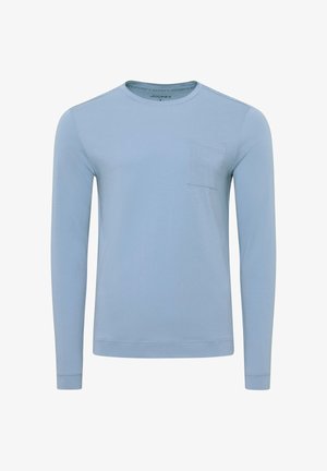 Ljusblå långärmad tröja med rundad halsringning, bröstficka och subtil logoband längs axelsömmarna, storlek medium.