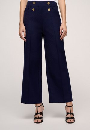 AFFITTO - Trousers - blu