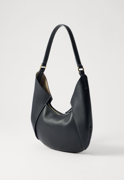 Ree Projects RIVA MINI - Käekott - black