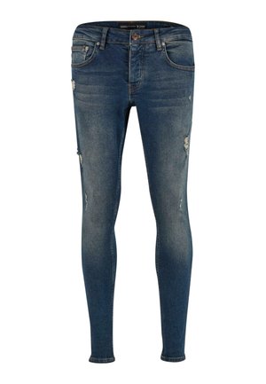 Skinny jeans in faded blue denim with distressed detailing. Features five pockets and a button closure. Smooth texture and fitted shape.