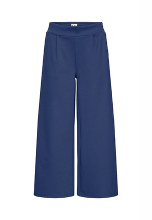 Pantalons larges en tissu bleu marine avec une taille élastique et deux poches avant. Texture lisse, coupe droite et design à mi-genoux.