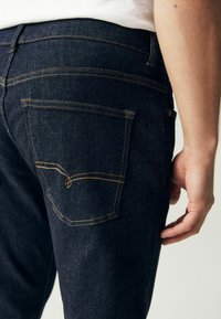 Next MOTION FLEX STRETCH - Vaqueros slim fit - blue indigo rinse