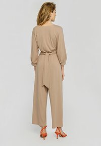 Madnezz House PAVO - Kombinezon