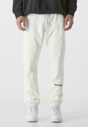 ESSENTIAL - Jogginghose - offwhite