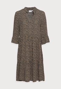 Svart midiklänning med beige abstrakt blommönster, V-ringning, trekvart ärmar och volangdetalj på kjolen.