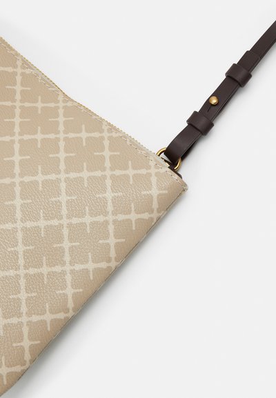 Beige textured leather bag featuring a grid pattern, gold-tone hardware, and a dark brown adjustable strap. Zipper closure at the top.