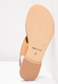KIOMI Sandaalit nilkkaremmillä - bronze