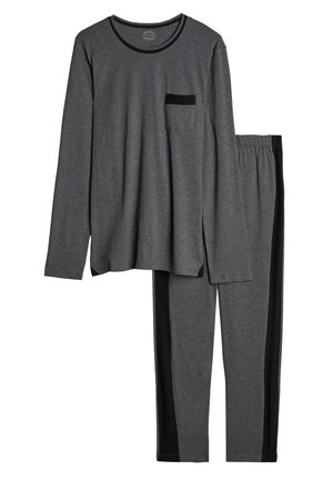 Graues Langarmoberteil mit schwarzer Tasche und schwarzem Saum, kombiniert mit passenden grauen Hosen mit schwarzen Seitenstreifen. Weicher, leichter Stoff.