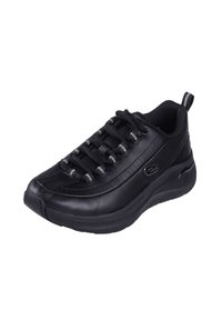 Zapatilla deportiva negra hecha de cuero sintético con una superficie texturizada, que cuenta con cordones grises y una pestaña trasera para ponérsela fácilmente.