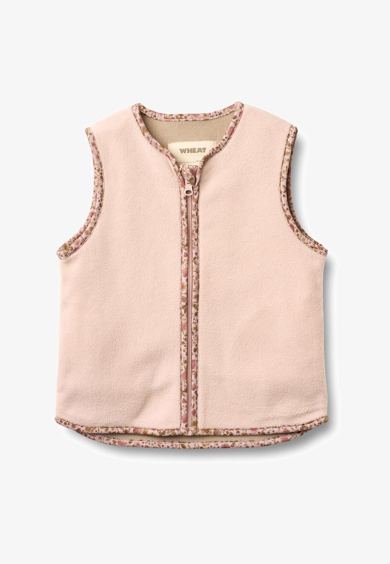 Light pink sleeveless fleece vest with floral trim around armholes, zipper, neckline, and hem, labeled "WHEAT" inside collar.