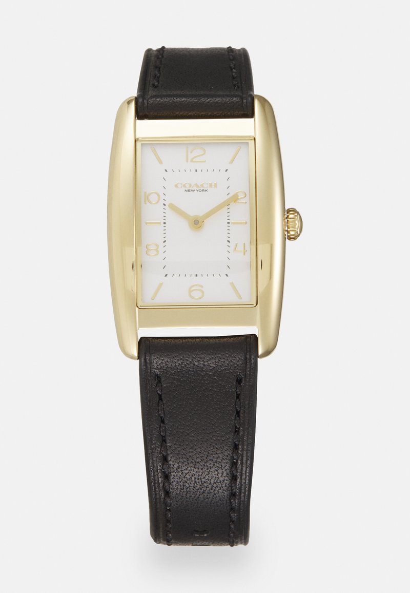 Montre rectangulaire dorée avec un cadran blanc, un bracelet en cuir noir, des index en or et une petite couronne accentuée.