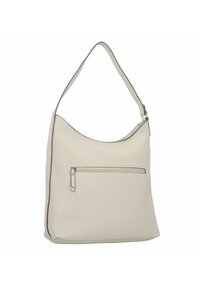 Sac à épaule en cuir beige avec une texture lisse, un dessus arrondi, une seule sangle et une poche zippée à l'avant.