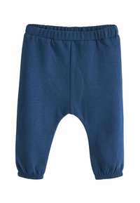 Zili kokvilnas bērnu bikses ar elastīgu jostu, savilktiem potīšu galiem un brīvu piegriezumu. Gluda tekstūra ar vienotu krāsu visā virsmā.