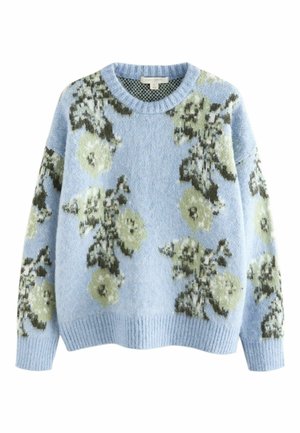 Light blue sweater featuring a floral pattern in green and cream. Soft texture with ribbed cuffs and hem, round neckline, oversized fit.