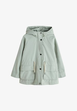 Veste imperméable à capuche vert clair avec boutons-pression à l'avant, taille ajustable par cordon et deux grandes poches à rabat.