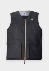 Svart nylonvest med glidelås foran som har gule detaljer, to store lommer foran og en logo på venstre bryst. Glatt, lett tekstur.