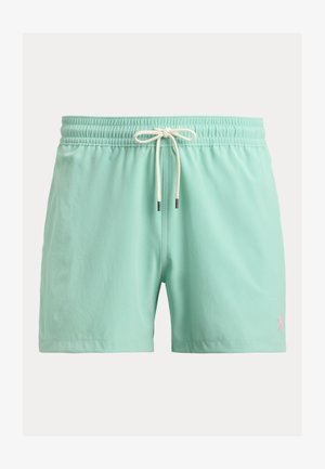 Plavky mintové zelené barvy s elastickým pasem a bílým stahovacím páskem, s malým růžovým vyšitým logem na levé nohavici.