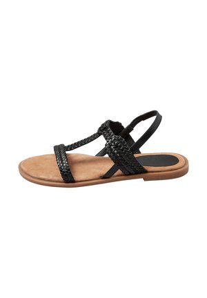 Flad sandal med tanfarvet sål og sorte fletstraps, med en rem bagpå og en rem over tæerne for sikker pasform.