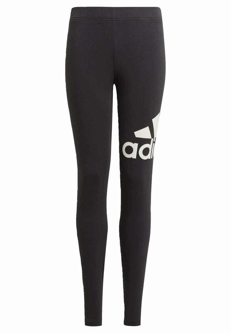 Leggings negros de tela elástica con cintura alta. Presentan un gran logo blanco de Adidas en el muslo izquierdo.