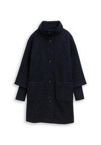 Marineblauer Fleece-Mantel mit hohem Kragen, vorderen Knöpfen, zwei großen Taschen und gerippten Ärmelbündchen. Weiche Textur, oversized Design.