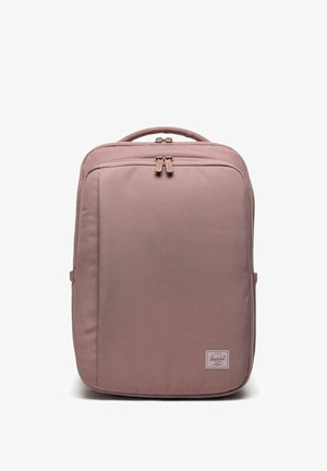 Zaino rettangolare color rosa polvere con manico superiore, tasca frontale con zip e patch con logo del marchio Herschel in basso a destra.