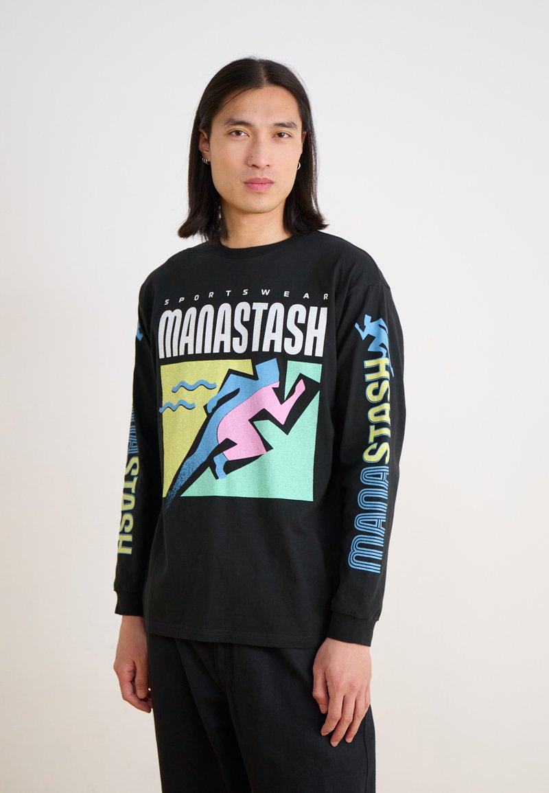 Black long-sleeve T-shirt featuring colorful graphic design: "MANASTASH" text and a pink and blue running figure.  Comfortable cotton material.