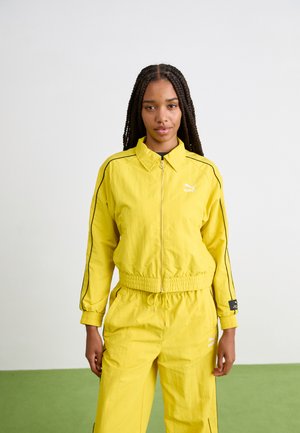 Puma T7  PLAY.LOUD. TRACK WV - Chaqueta de entrenamiento - fresh pear