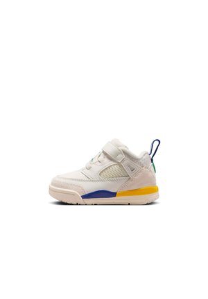 Witte en beige peutersneaker met gele en blauwe accenten op de zool, mesh zijkanten en een klittenbandsluiting, zijaanzicht op een witte achtergrond.