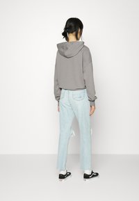 American Eagle MOM  - Calças de ganga de perna direita - aged blue traveller