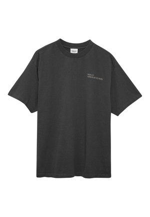 Black short-sleeve crew neck t-shirt with small white text "HALO 196819721981" on the left chest area.