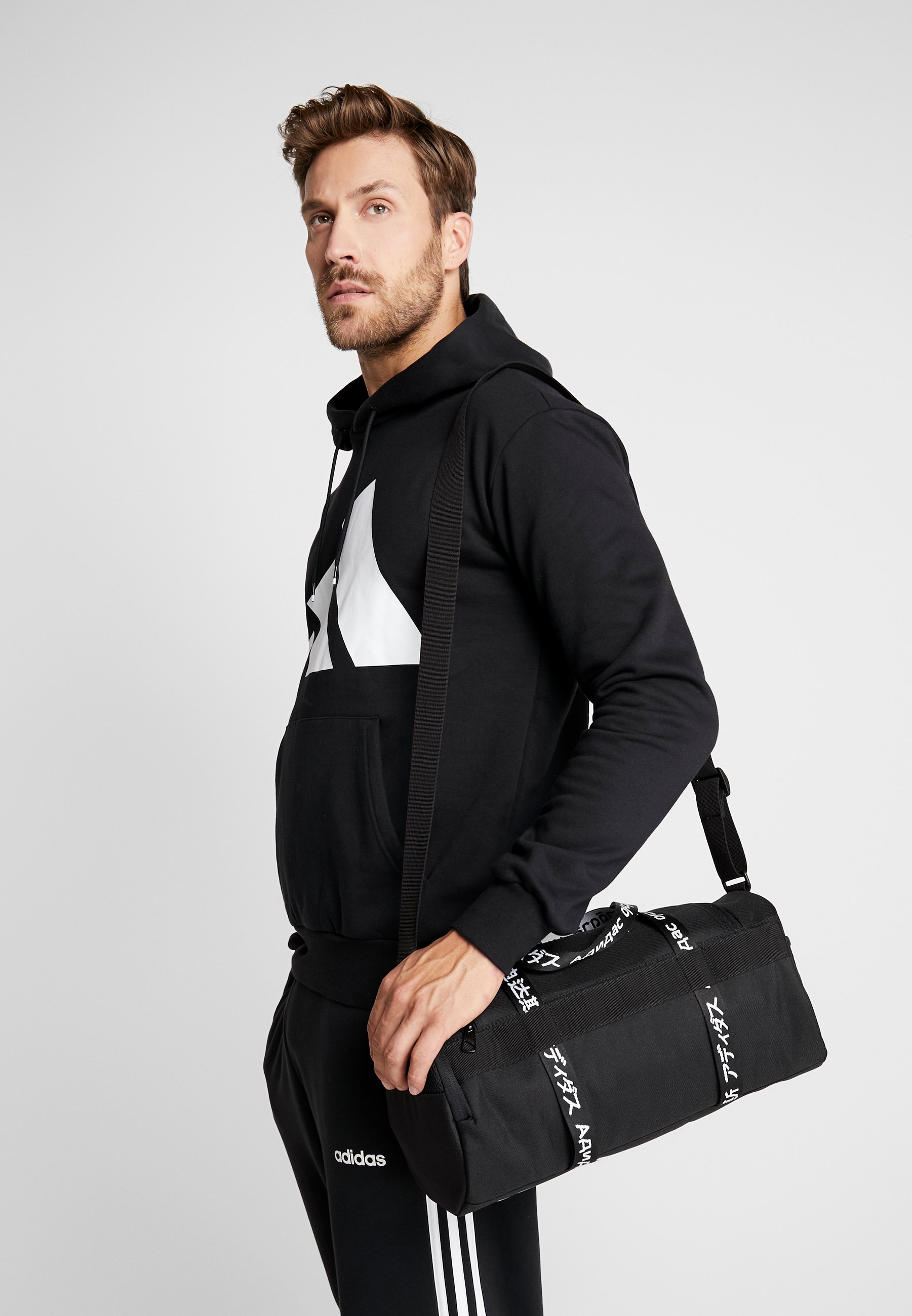 adidas Performance 4ATHLTS ESSENTIALS 3STRIPES SPORT DUFFEL BAG - Sports  bag - black/white/black - Zalando.de