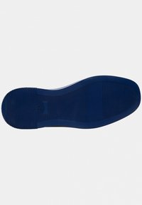 Suola di scarpa in gomma blu navy con superficie testurizzata, caratterizzata da scanalature per la trazione e un bordo liscio e arrotondato.