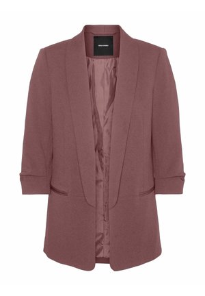 Blazer rose avec une texture douce, à l'avant ouvert et à manches trois quarts. Dispose de poches latérales et ne possède pas de fermetures.