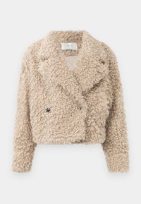 Beige kort jacka gjord av strukturerat, krulligt tyg med dubbelknäppt front, slag på kragen och svarta knappar.