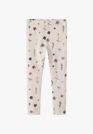 Leggings in roomkleur met een patroon van kleine, meerkleurige wilde bloemen en groene bladeren gelijkmatig verdeeld.