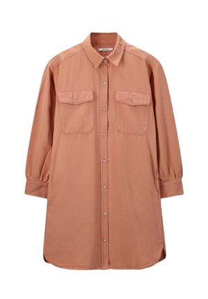 Long-sleeve, button-up shirt in muted rose color, featuring two chest pockets, a classic collar, and a relaxed fit with rounded hem.