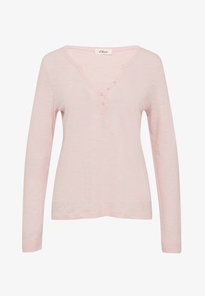 Helles rosa Langarmoberteil mit V-Ausschnitt und drei Knöpfen. Hergestellt aus weichem Stoff mit leicht strukturierter Oberfläche.