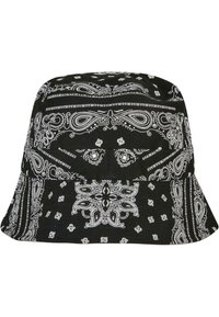 Black bucket hat featuring intricate white paisley patterns across the fabric, with a wide, flat brim and a structured crown.