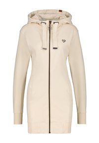 Cremefarbener Kapuzenpullover mit Reißverschluss, zwei seitlichen Taschen, gerippten Bündchen, einer verstellbaren Kapuze und einem kleinen Herz-Logo auf der Brust.
