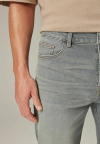 Next MOTION FLEX STRETCH - Straight leg -farkut - light grey