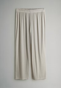 Lichtgewicht, gestreepte broek met een elastische tailleband. De stof is zacht en heeft afwisselend dunne grijze en witte strepen.