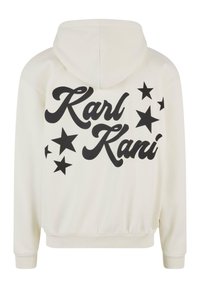 Kremfarget hettegenser med en fremtredende svart "Karl Kani" logo og stjernedesign på ryggen. Laget av myk, behagelig stoff med ribbede mansjetter.