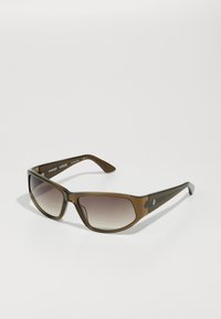 Plastic sunglasses with a brown tortoiseshell frame, gradient lenses, and sleek temples featuring subtle branding detail.