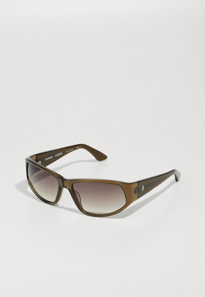 Plastic sunglasses with a brown tortoiseshell frame, gradient lenses, and sleek temples featuring subtle branding detail.