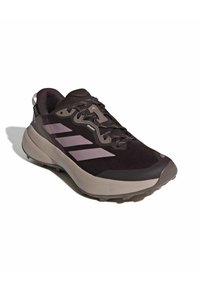 Black and gray athletic shoe with lace-up design, cushioned sole, and three gray stripes on the side, displayed on a white background.