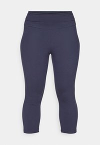 Námořnické modré capri legíny vyrobené z elastické látky, s širokým, skládacím pasem a hladkým povrchem. Žádné viditelné vzory nebo akcenty.