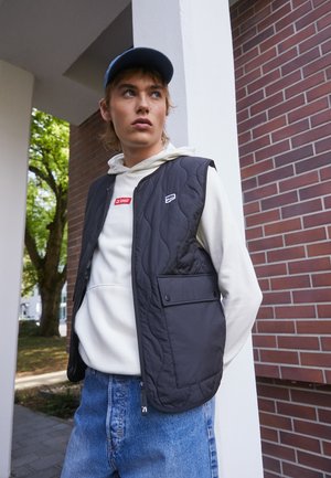 Puma DOWNTOWN PADDED GILET - Smanicato - black